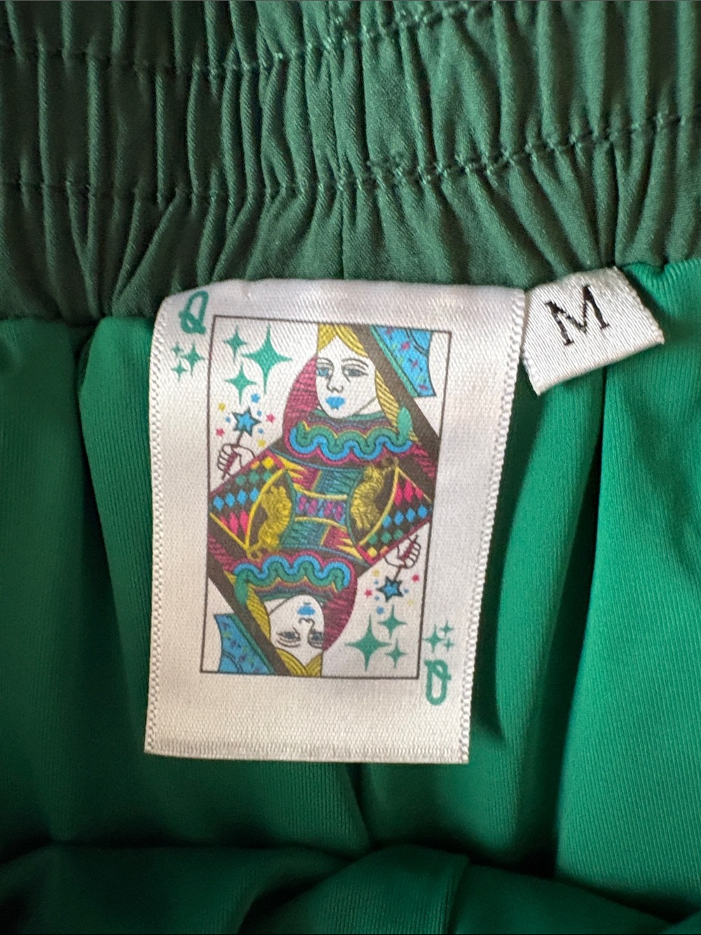 QUEEN OF SPARKLES Green Athletic Shorts with White Trim and Gold Side Stripe - Picture 2 of 8